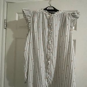 Loft- Sleeveless cotton ruffled shirt.